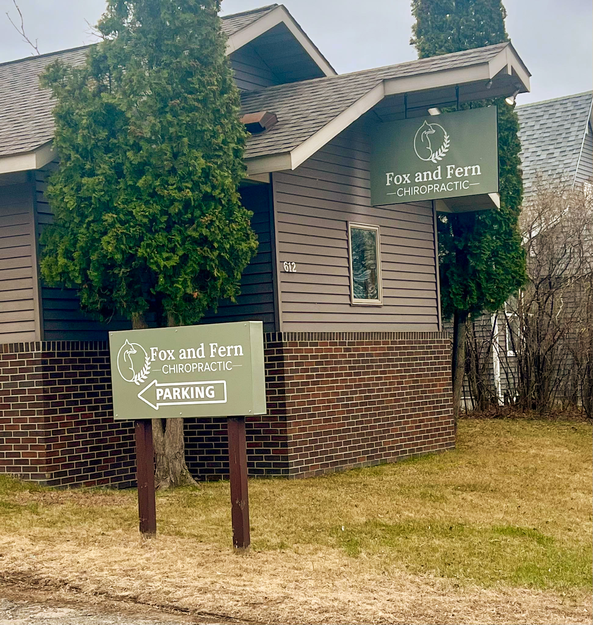 fox-and-fern-chiropractic-building-exterior The exterior building and outdoor signage for Fox and Fern Chiropractic, located in a converted residential space at 612 5th St NW in Bemidji, MN.